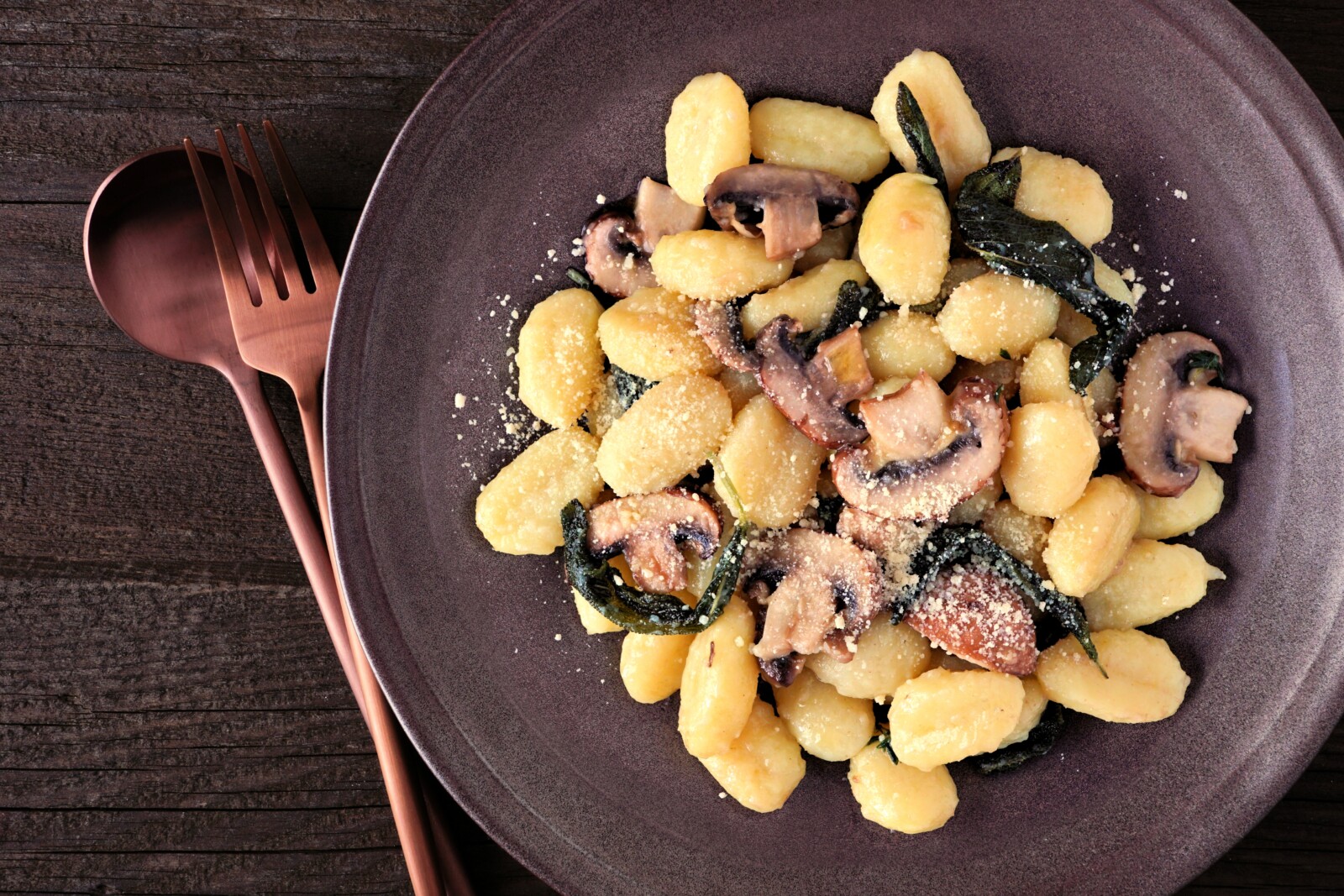Gnocchi,With,Mushrooms,In,A,Brown,Butter,Sage,Sauce.,Top