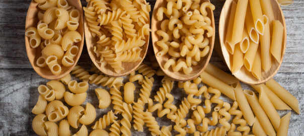 Various,Mix,Of,Pasta,On,Wooden,Rustic,Background,,Sack,And