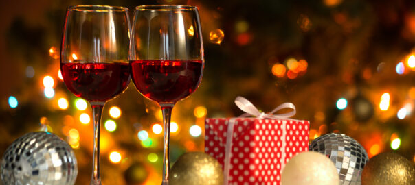 Crystal,Glasses,Of,Wine,And,Christmas,Balls,And,Christmas,Gifts